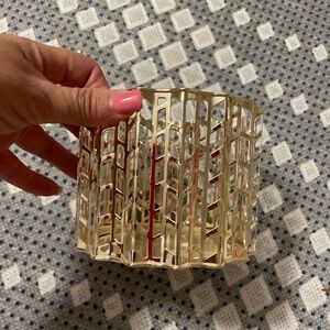 Never used. Hold color candle holder